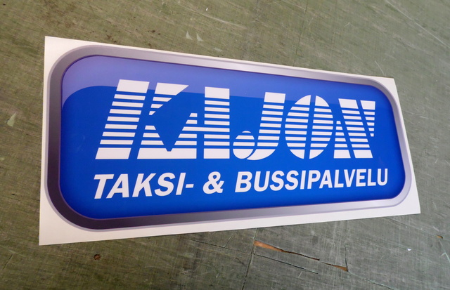 Kajon kaksipuolinen ovitarra