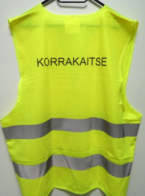 Heijastinliivi logolla Korrakaitse Heijastinliivi logolla Korrakaitse