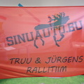 Mainoslippu Truu ja Jürgens rallitiim